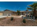 Single-story house with desert landscaping and mature foliage at 5170 S Pearl St, Las Vegas, NV 89120