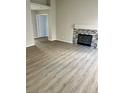 Living room with stylish flooring and a cozy fireplace at 5512 Del Lago Dr, Las Vegas, NV 89130