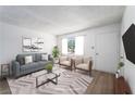 Inviting living room featuring a comfortable seating arrangement and stylish accents at 6121 Iris Cir, Las Vegas, NV 89107