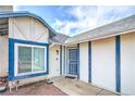 Inviting front entry featuring white trim and a secure screen door at 824 Schooner Dr, Henderson, NV 89015