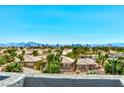 An elevated view captures the city skyline, showcasing the neighborhood's proximity to urban amenities at 9050 W Tropicana Ave # 1075, Las Vegas, NV 89147