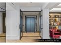 Elegant private elevator entry featuring chevron floors and upscale finishes at 9101 Alta Dr # 1604, Las Vegas, NV 89145