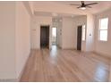 Bright living room featuring wood floors, neutral walls and modern finishes at 9604 Flying Eagle Ln, Las Vegas, NV 89123