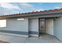 Side entrance with security door and decorative window for added curb appeal at 5553 Super Bowl Dr, Las Vegas, NV 89110