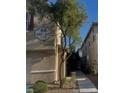 Exterior view of the building, showcasing the unit numbers and landscaping at 6255 W Arby Ave # 239, Las Vegas, NV 89118