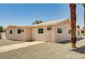 Cozy single-story home with a front door and a low maintenance gravel yard at 629 N 16Th St, Las Vegas, NV 89101