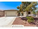 Inviting single-Gathering home with a neat front yard, complemented by desert landscaping and a cozy patio area at 6617 Johnny Love Ln, North Las Vegas, NV 89086