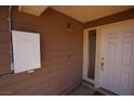 A well-maintained front door entrance, enhanced by a Tesla power wall, adds convenience and efficiency at 6812 Sheffield Dr, Las Vegas, NV 89108