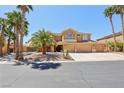 Gorgeous two-story home with a three-car garage and desert landscaping at 7301 Heggie Ave, Las Vegas, NV 89131