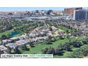 Aerial view of a community, highlighting location, golf course access, and surrounding urban landscape at 778 Vegas Valley Dr, Las Vegas, NV 89109