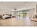 Spacious main bedroom with a fireplace, ceiling fan, and access to a private balcony overlooking the golf course at 778 Vegas Valley Dr, Las Vegas, NV 89109