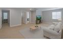 Spacious room with neutral carpet and walls, and lots of natural light at 9780 Ziegler Ave, Las Vegas, NV 89148