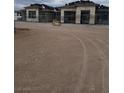 Exterior of a home under construction with a stone facade and a partially completed roof at 1550 W Jornada St, Pahrump, NV 89048