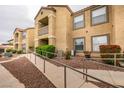 Exterior view featuring accessible access with sidewalks, ramps and building details at 2300 E Silverado Ranch Blvd # 1070, Las Vegas, NV 89183