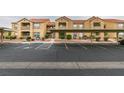 Exterior full view showing a condo complex with parking and walkways at 2300 E Silverado Ranch Blvd # 1070, Las Vegas, NV 89183