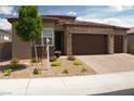 Charming single-story home with desert landscaping and a spacious garage at 3395 Sleeping Hills Ave, Henderson, NV 89044