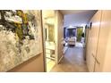 Hallway leading to living room with a partial view of the bathroom at 3722 Las Vegas Blvd # 809, Las Vegas, NV 89158