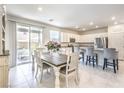 Bright kitchen with stainless steel appliances and granite countertops at 4145 Nopal Serrano Ave, Las Vegas, NV 89141
