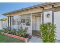 The front porch features a decorative security door and manicured landscaping at 4302 Newhaven Dr, Las Vegas, NV 89147