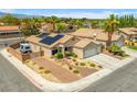 Expansive single-story home with solar panels, desert landscaping, and an RV parking space at 5421 Tourmaline St, Las Vegas, NV 89130
