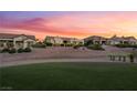 Scenic view of the community with lush green fairways and beautifully landscaped homes at 9812 Folsom Dr, Las Vegas, NV 89134