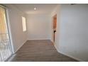 Inviting living room with balcony access and kitchen view at 270 E Flamingo Rd # 136, Las Vegas, NV 89169