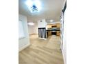 Well-lit open floor plan with modern flooring, connecting living and kitchen areas at 4248 Tara Ave # 2, Las Vegas, NV 89102