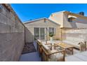 Cozy backyard area featuring comfortable outdoor seating, perfect for relaxing or entertaining guests at 5078 Mountain Vista St, Las Vegas, NV 89120