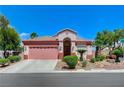 Beautiful single-story home with mature trees and landscaping; complete with a two-car garage at 8250 Lincoln Valley St, Las Vegas, NV 89123