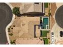 Beautiful backyard with pool, spa, patio, and low maintenance landscaping at 8953 Hitch Creek St, Las Vegas, NV 89131