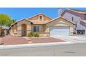 Charming single-story home features a classic design, well-maintained landscaping, and a convenient two-car garage at 4619 Reliant St, North Las Vegas, NV 89031