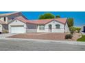 Charming single-story home with a well-maintained exterior, attached garage and desert landscaping at 5622 Sage Pines Dr, Las Vegas, NV 89118