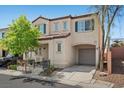 Charming two-story home with a well-maintained front yard and covered porch at 6729 Churnet Valley Ave, Las Vegas, NV 89139