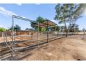 Fenced horse property with covered area for horses and ample space to roam at 6920 Bradley Rd, Las Vegas, NV 89131