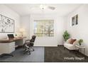 Bright home office features a modern desk, comfortable chair, and ample natural light at 913 Duckhorn Ct # 204, Las Vegas, NV 89144