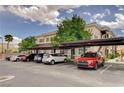A complex featuring covered parking spaces for residents and visitor parking at 9303 Gilcrease Ave # 2198, Las Vegas, NV 89149