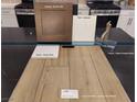 Kitchen finish samples with cabinets, paint, quartz, flooring and faucet at 1544 Little Penguin St, Las Vegas, NV 89138