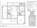 Detailed floor plan showcasing the layout of rooms, including bedrooms, bathrooms, kitchen, living spaces, and garage at 1760 Omaha Ave, Pahrump, NV 89048