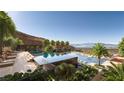 Luxurious community pool area with mountain views and plenty of lounging space at 400 Rock Peak Dr # 2301, Henderson, NV 89012
