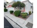 This home features desert landscaping at 5165 Briar Meadow Way, Las Vegas, NV 89118