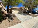 Charming home featuring a low maintenance yard and a two-car garage at 5474 Jacobs Field St, Las Vegas, NV 89148