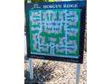 Community map of Morgyn Ridge showing the layout of buildings, clubhouse, and fire hydrants at 8555 W Russell Rd # 2020, Las Vegas, NV 89113