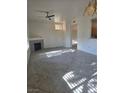 Bright living room with a fireplace and tile floors, offering a cozy space at 8985 S Durango Dr # 1154, Las Vegas, NV 89113