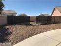 Spacious backyard featuring a gate, offering privacy and access to the surrounding area at 1083 Sterling Peak St, Las Vegas, NV 89110