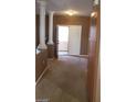 Inviting entryway showcasing decorative columns and convenient cabinet storage at 1423 Orange Jubilee Rd, Henderson, NV 89014