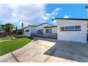 Inviting single-story home featuring a well-manicured lawn and updated exterior, creating instant appeal at 2200 Santa Ynez Dr, Las Vegas, NV 89104