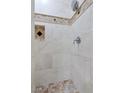 Shower stall showcasing neutral-toned tiling, a tiled floor, and stylish shower head at 2615 W Gary Ave # 1041, Las Vegas, NV 89123