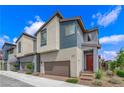 Well-maintained home with modern exterior, two-car garage, and landscaped front yard at 3192 Timorasso Ave, Henderson, NV 89044