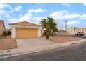 The single-story home includes a tile roof and a two car garage at 4110 Bonita Desert Ct, North Las Vegas, NV 89032