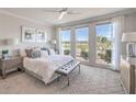 Bright bedroom with three large windows providing ample natural light and views of the outdoors at 4924 E Cactus Canyon Dr, Pahrump, NV 89061